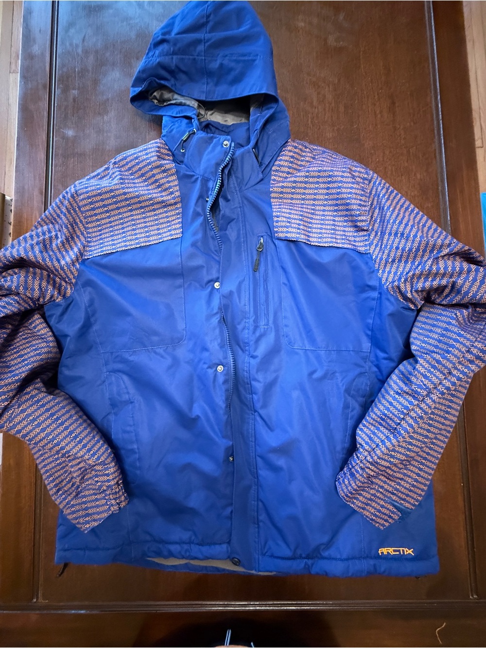 Arctix Men's Royal Blue Hooded Ski Jacket with Patterned Accents